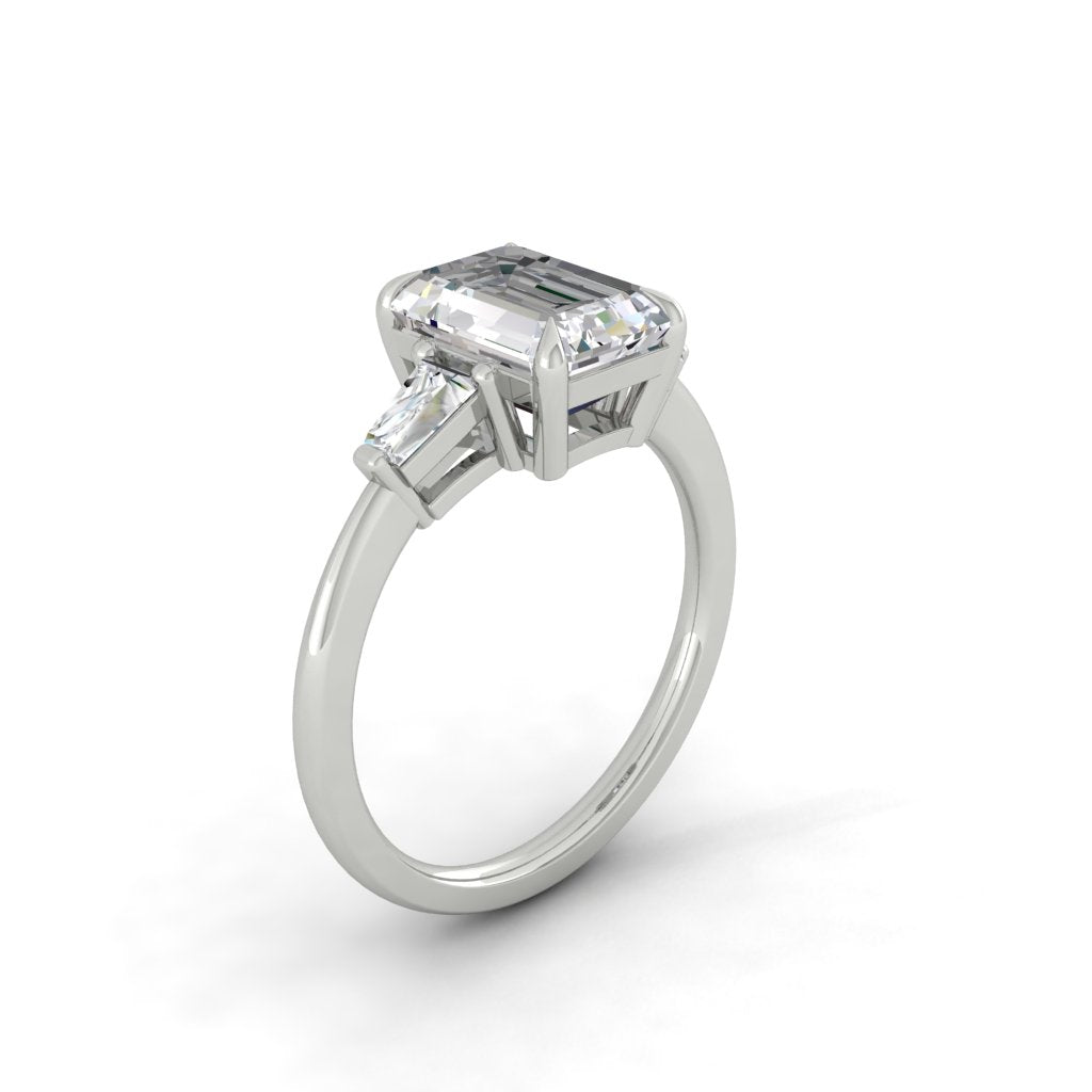 The Lucia - 1 to 3 Carats Emerald Cut Moissanite Ring with baguette side stones in 18K White, Yellow or Rose Gold