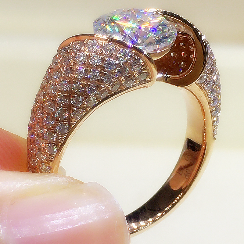 The Royale - Round Cut Floating Moissanite Pavé Ring with 1 to 3 carats in 18K Rose Gold