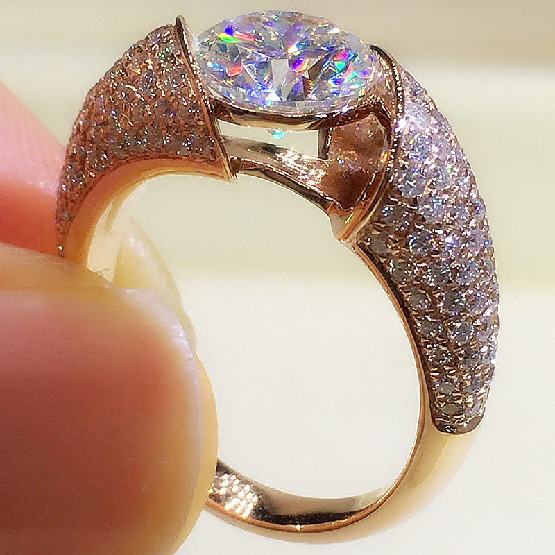 The Royale - Round Cut Floating Moissanite Pavé Ring with 1 to 3 carats in 18K Rose Gold