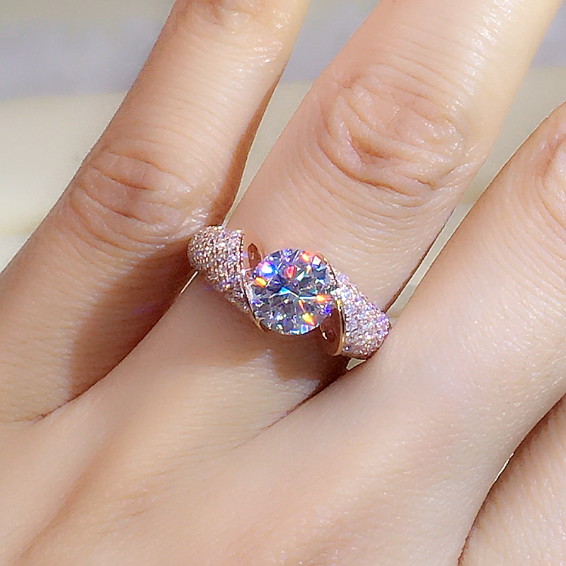 The Royale - Round Cut Floating Moissanite Pavé Ring with 1 to 3 carats in 18K Rose Gold